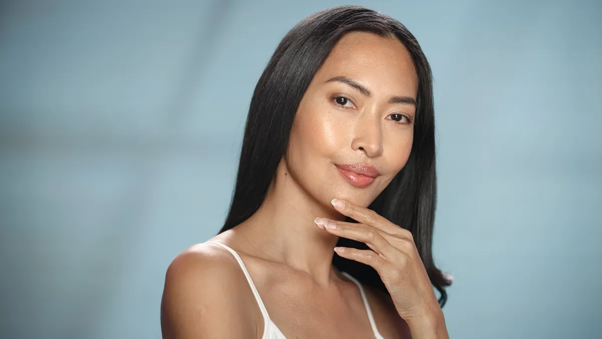 Asian woman portrait with flawless smooth skin