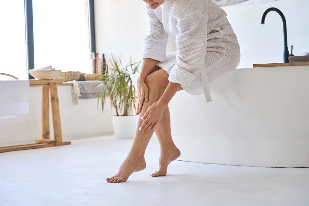 Woman walking barefoot at home representing healthy lifestyle