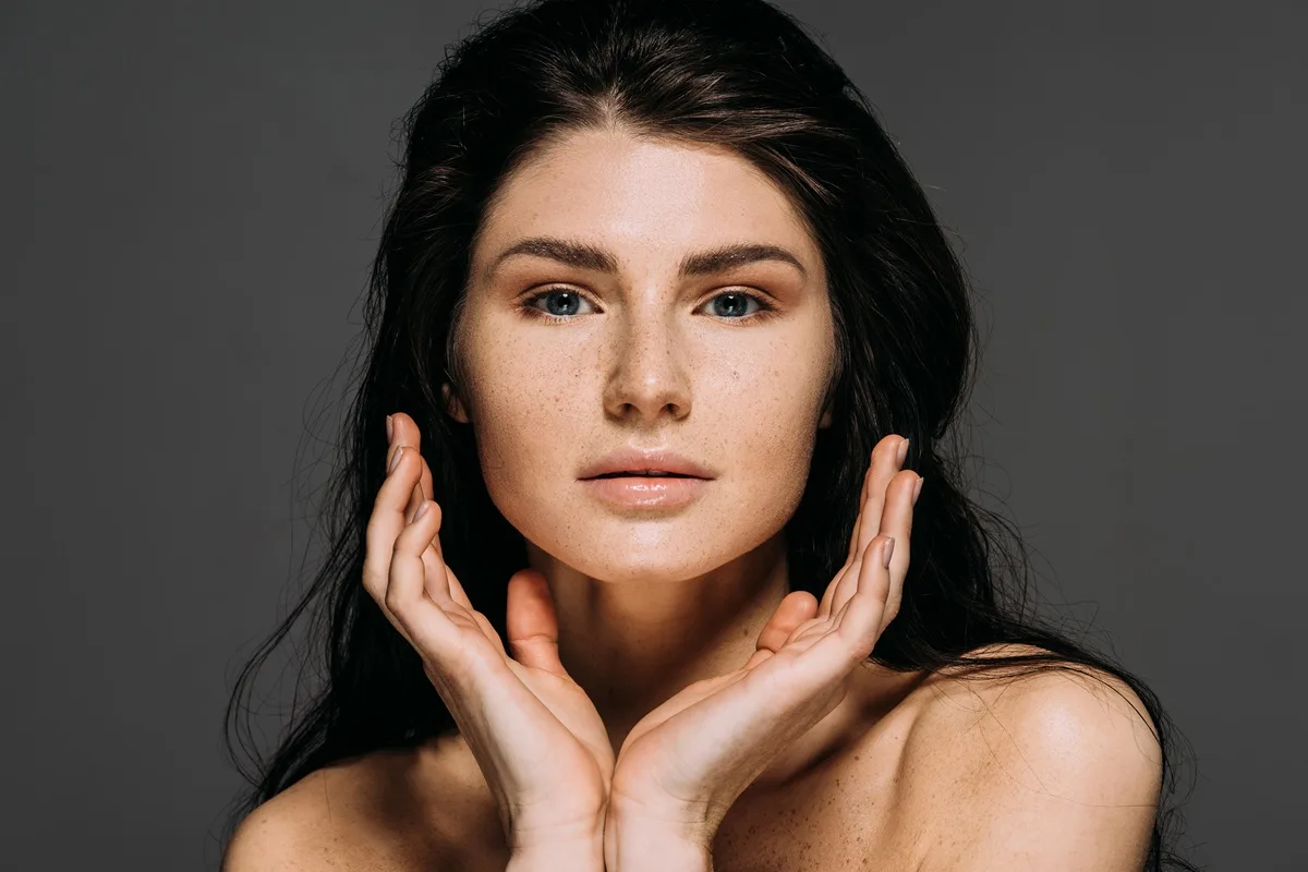Beauty portrait of woman with clear radiant skin