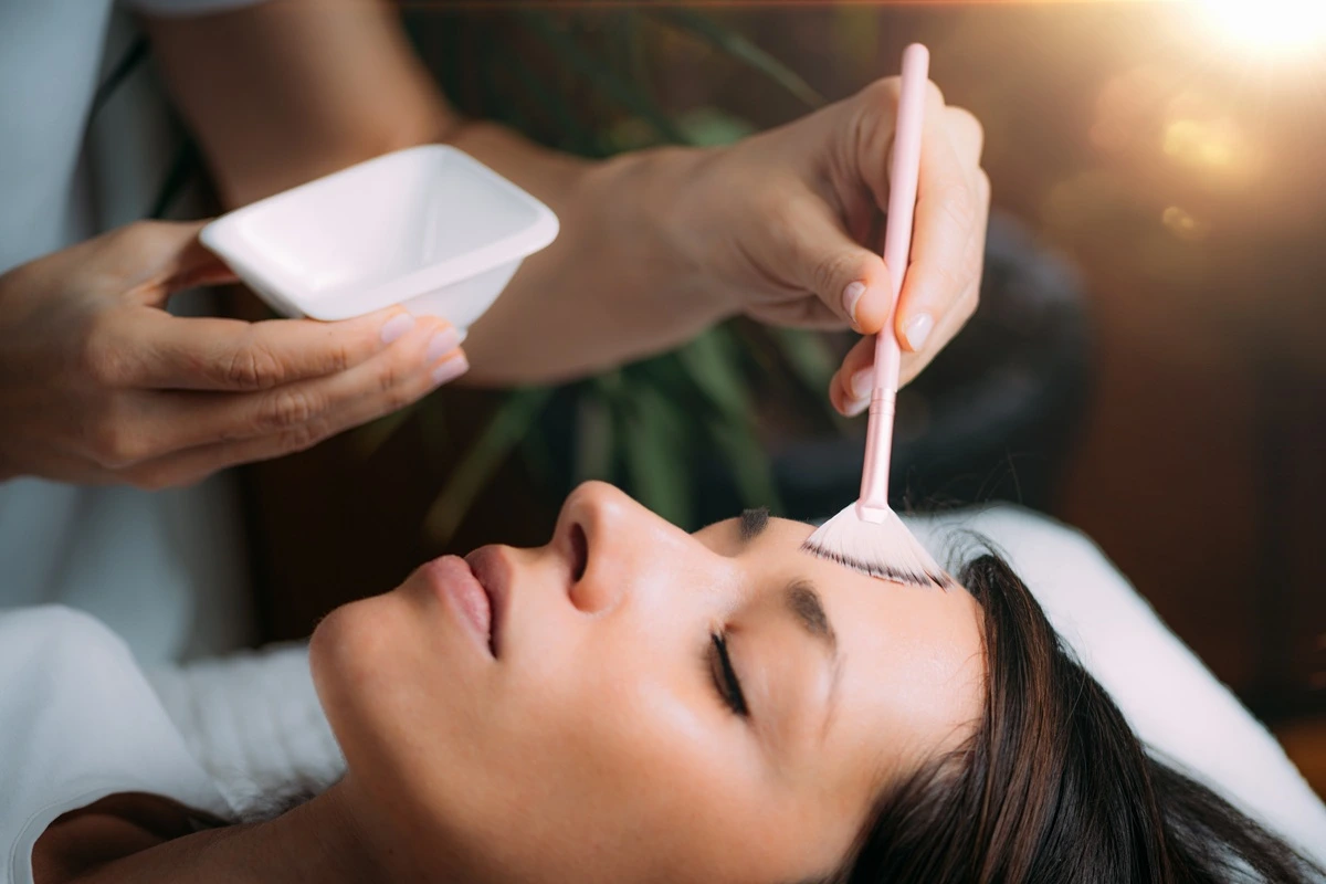 Chemical peel application during facial treatment
