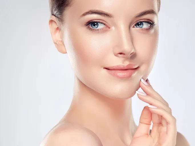 Young woman portrait with natural radiant complexion