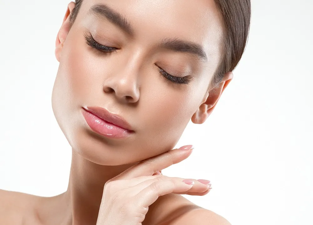 Beauty portrait of woman with flawless smooth skin